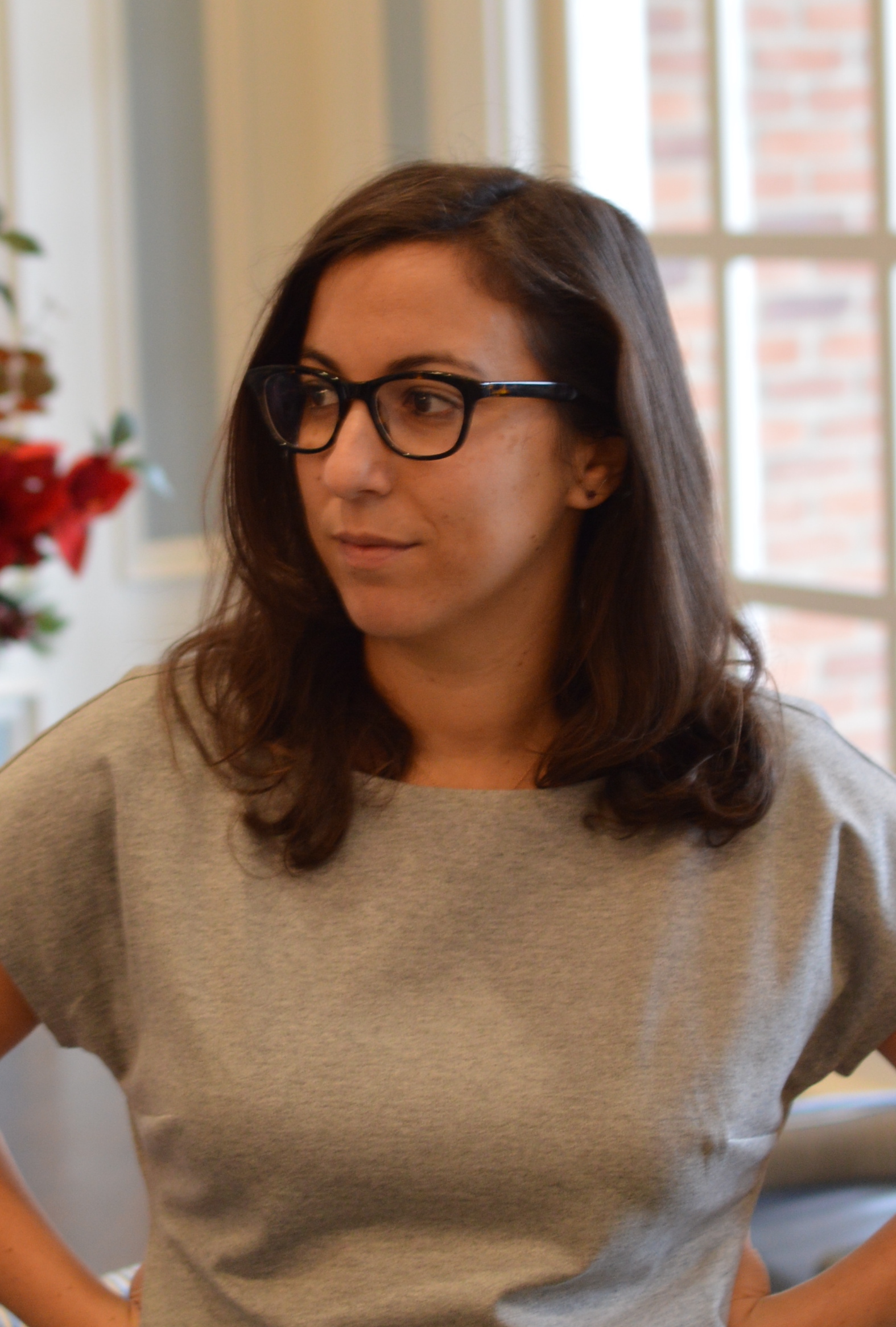 An indoor photo of Nicole Bradick  wearing glasses 